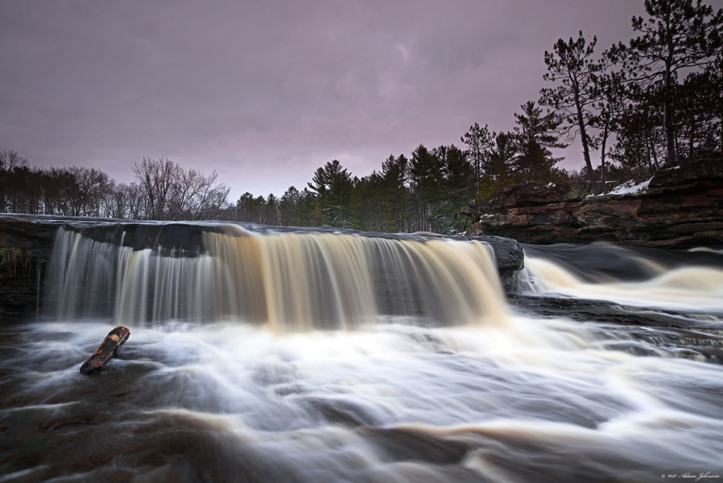 Water flowing over Big Spring Falls In Autumn