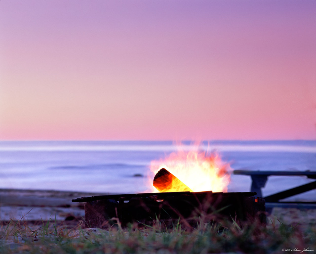 Campfire on the beach at Zippel Bay State Park