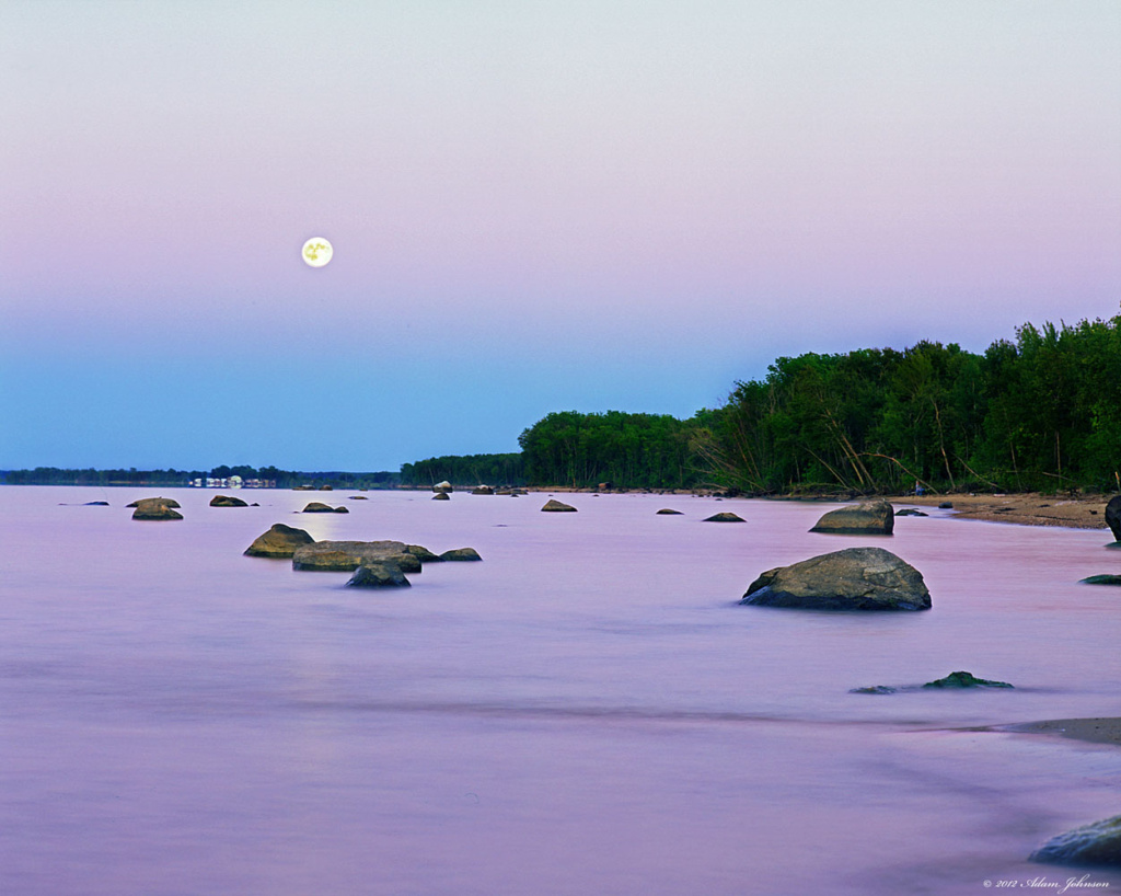 Full moon rising and Lake Of the Woods at Zippel Bay State Park