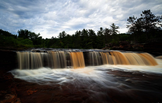 Water flowing over Big Spring Falls Banning State Park