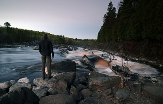 Standing on the rocks of the Saint Louis River on a cool spring night | Jay Cooke State Park