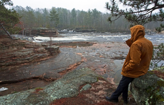 "Exploring in the Rain" Sitting on rocks in the rain looking out at Big Spring Falls Banning State Park