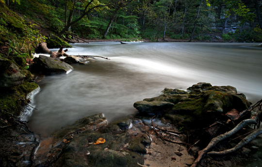 3 days after heavy rain the creek is overflowing its banks - Minneopa State Park