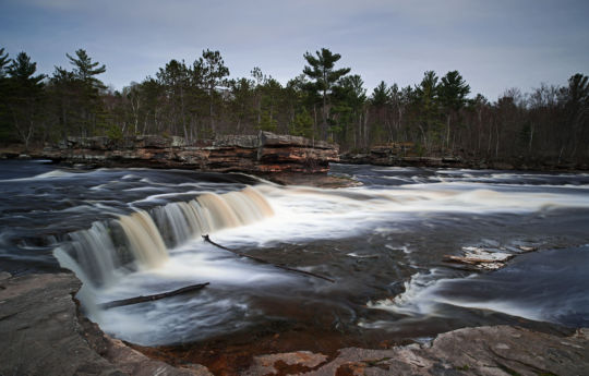 High water and stripped logs at Big Spring Falls | Big Spring Falls Banning State Park