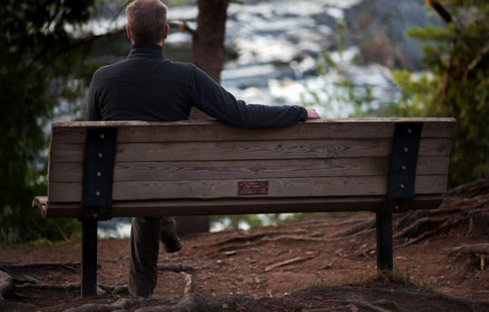 Sitting on a bench above the Saint Louis River in spring | Jay Cooke State Park