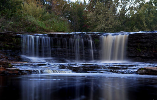 Water flowing over Big Spring Falls at twilight - Big Spring Falls Banning State Park