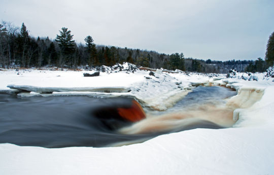 Saint Louis River flowing through snow and ice | Jay Cooke State Park