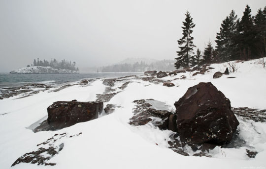 Wind and blowing snow on the rocky shoreline at Split Rock Lighthouse State Park