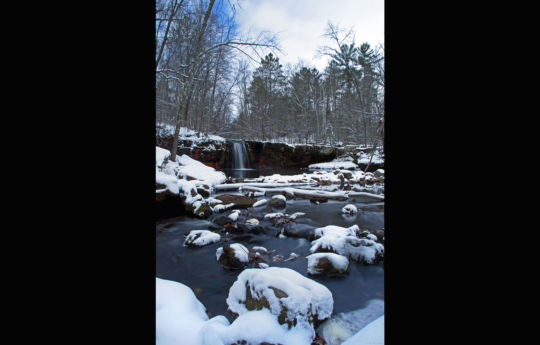 Fresh snow and blue sky at Wolf Creek Falls | Banning State Park