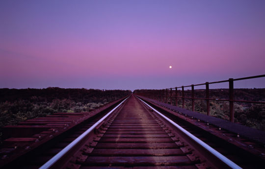 Full moon rising over the Arcola Soo Line bridge 30 minutes after sunset